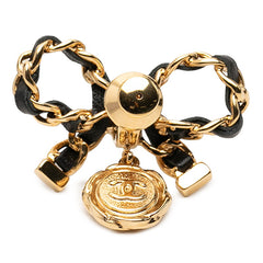シャネル ココマーク リボンモチーフ ピンブローチ I22A刻印 ゴールド ブラック メッキ レザー レディース CHANEL 中古