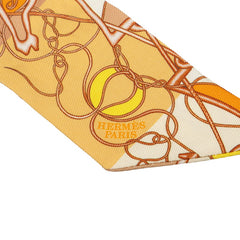 エルメス ツイリー Coup de Fouet au Bloc クー ドゥ フエ オ ブロック スカーフ 新タグ オレンジ シルク レディース HERMES 【中古】