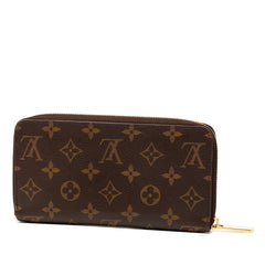 ルイ ヴィトン モノグラム ジッピー ウォレット ラウンドファスナー 長財布 M60017 ブラウン PVC レザー レディース LOUIS VUITTON 【中古】