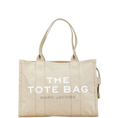 マークジェイコブス ザ ミディアム トラベラー グラフィック トートバッグ ベージュ ホワイト キャンバス レディース MARC JACOBS 【中古】