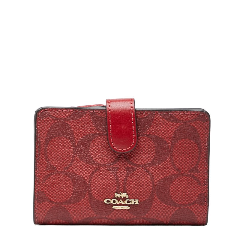 コーチ シグネチャー 二つ折り財布 レッド PVC レザー レディース COACH 【中古】