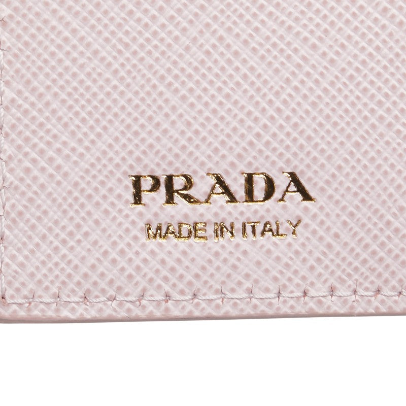プラダ エンボスロゴ 二つ折り財布 ピンク サフィアーノ レザー レディース PRADA 【中古】