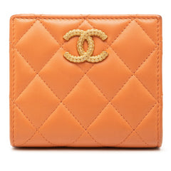 シャネル ココマーク マトラッセ 二つ折り財布 オレンジ ラムスキン レディース CHANEL 【中古】