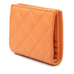 シャネル ココマーク マトラッセ 二つ折り財布 オレンジ ラムスキン レディース CHANEL 【中古】