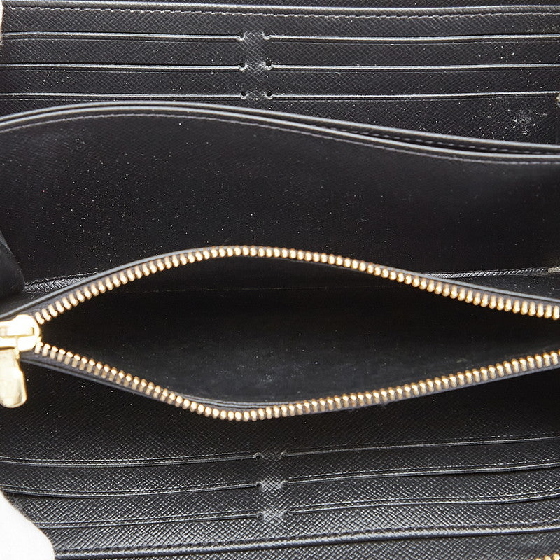 ルイ ヴィトン モノグラム ジャイアント リバース 長財布 ラウンドファスナー M69353 ブラウン PVC レザー レディース LOUIS VUITTON 【中古】