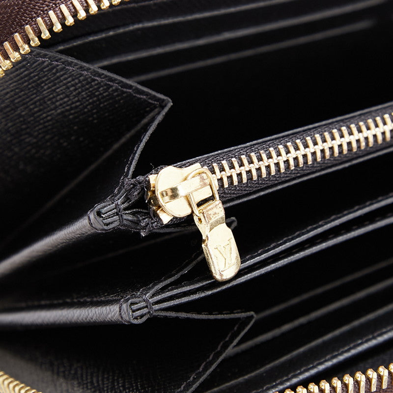 ルイ ヴィトン モノグラム ジャイアント リバース 長財布 ラウンドファスナー M69353 ブラウン PVC レザー レディース LOUIS VUITTON 【中古】